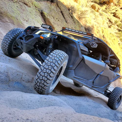 Side view of ATV on boulders